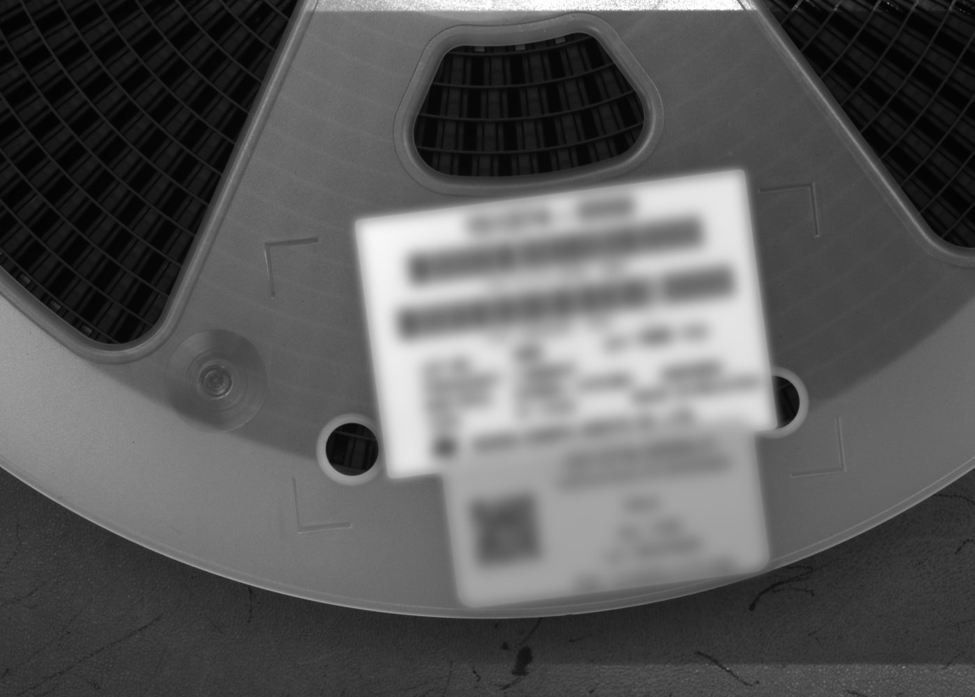 Electronic-component reel imaged for deep-learning label OCR